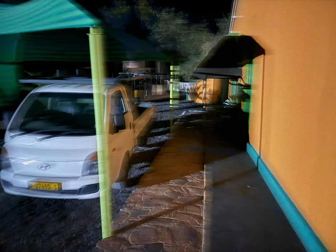Bakkie parked under the carport at night