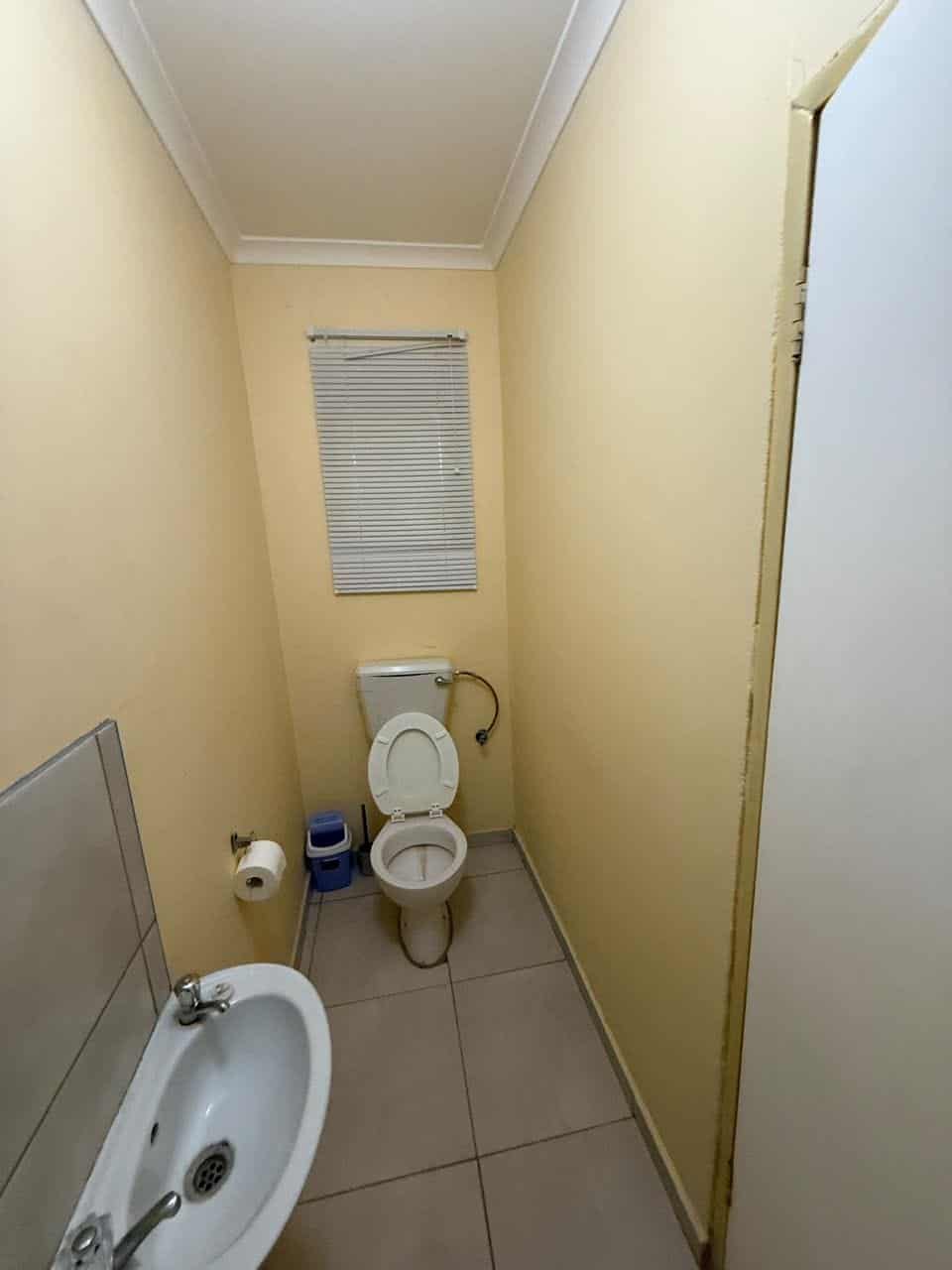 Bathroom with toilet and wash basin