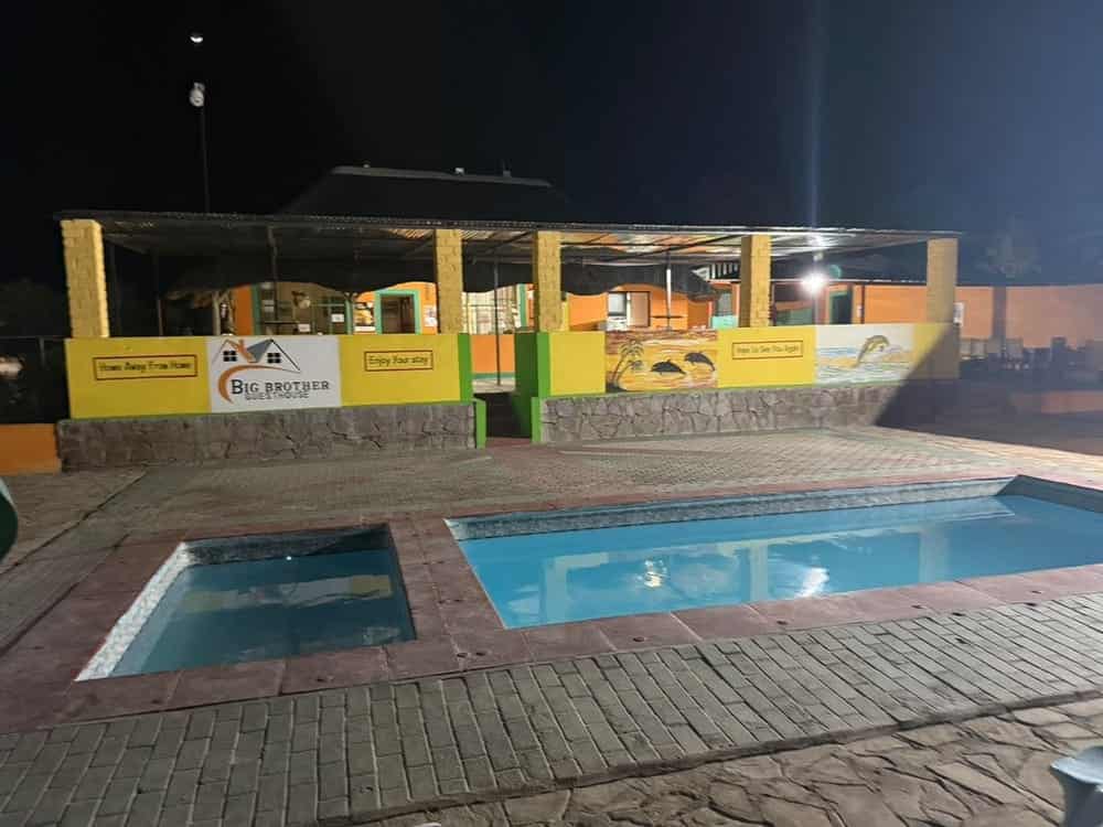 Floodlit pool after dark