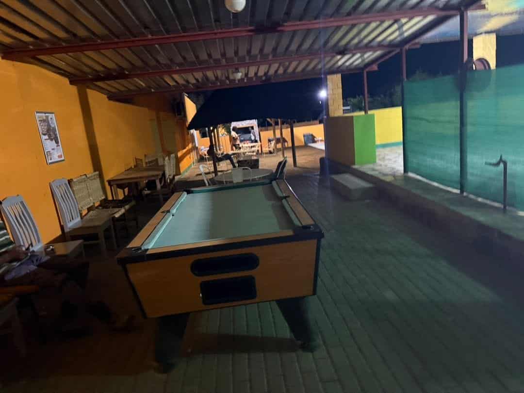 Pool table under the lapa roof at night