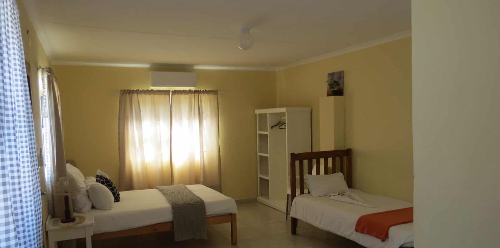 Double room with air-conditioner and bedside tables