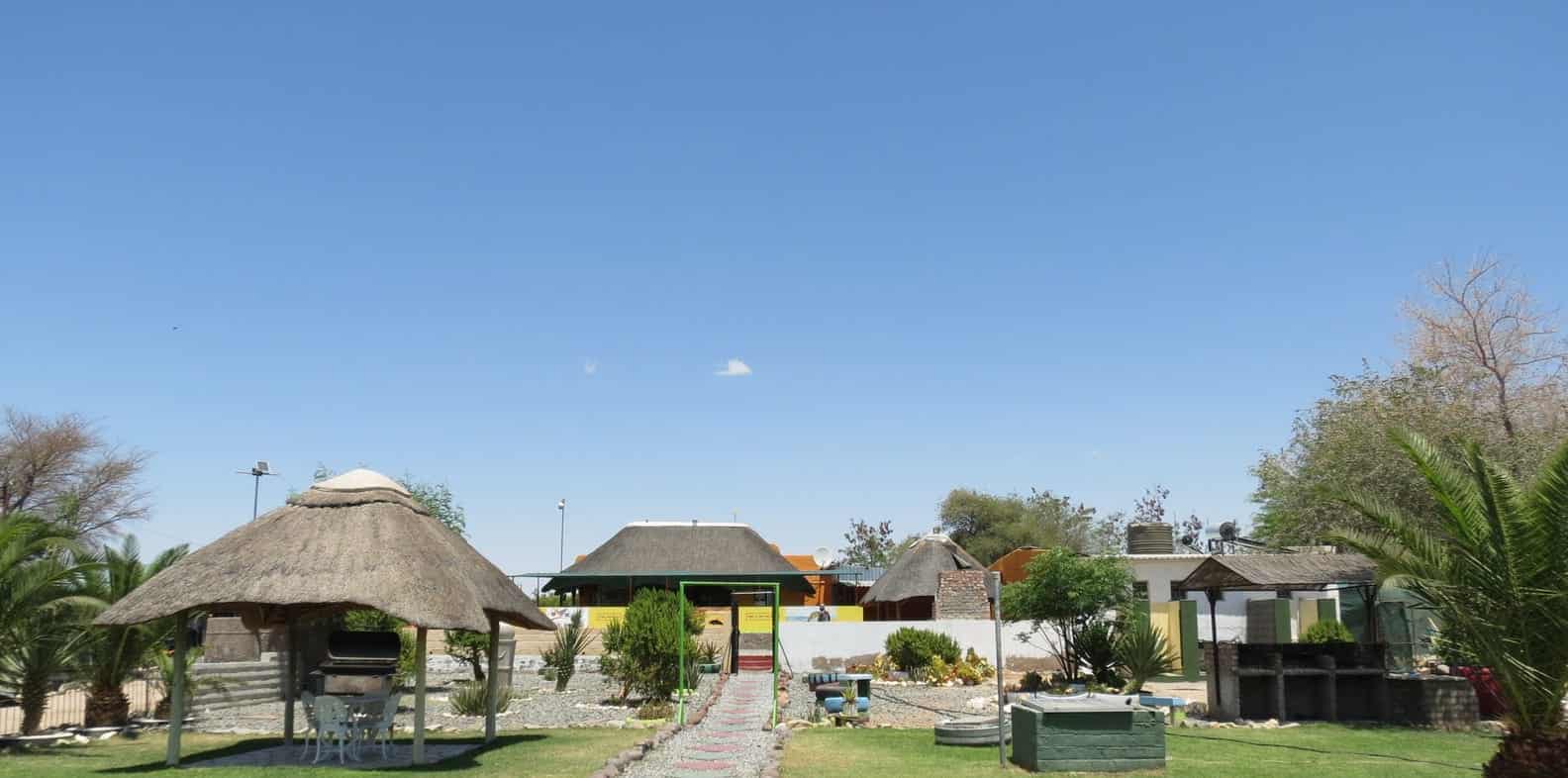 Thatched umbrella at the garden path