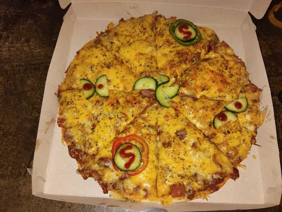 Freshly baked pizza from the oven