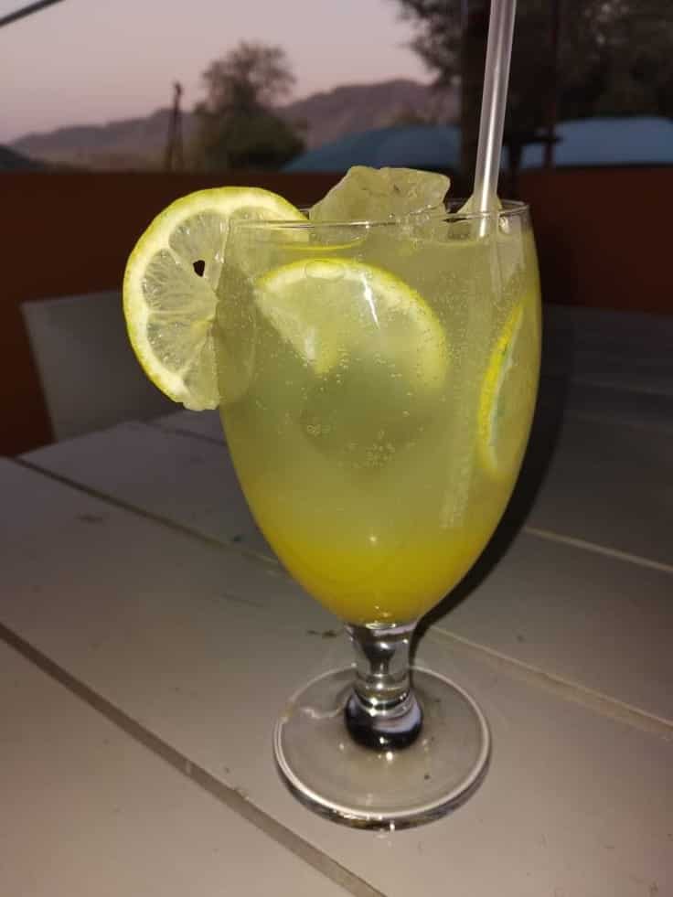 Lemon cooler with ice on the table