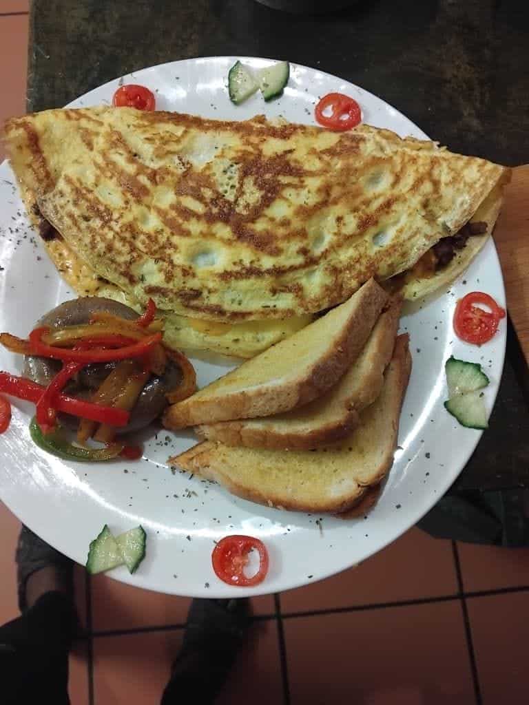 Omelette with buttered toast triangles