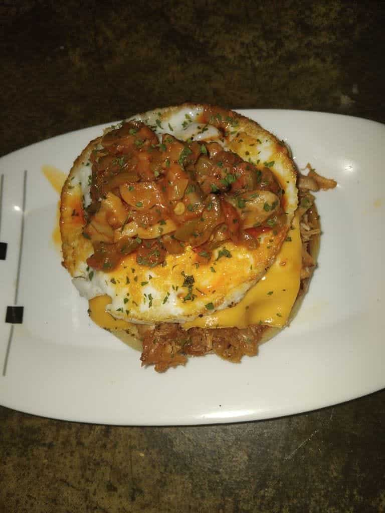 Stuffed pancake on a white plate