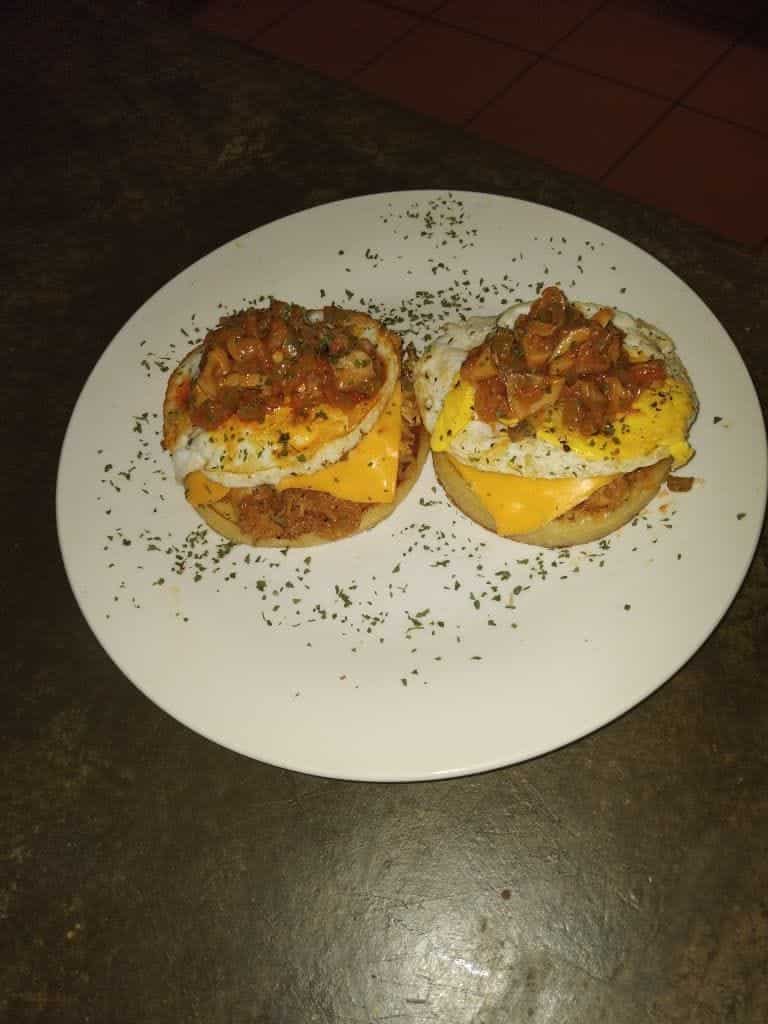 Two stuffed pancakes on a plate