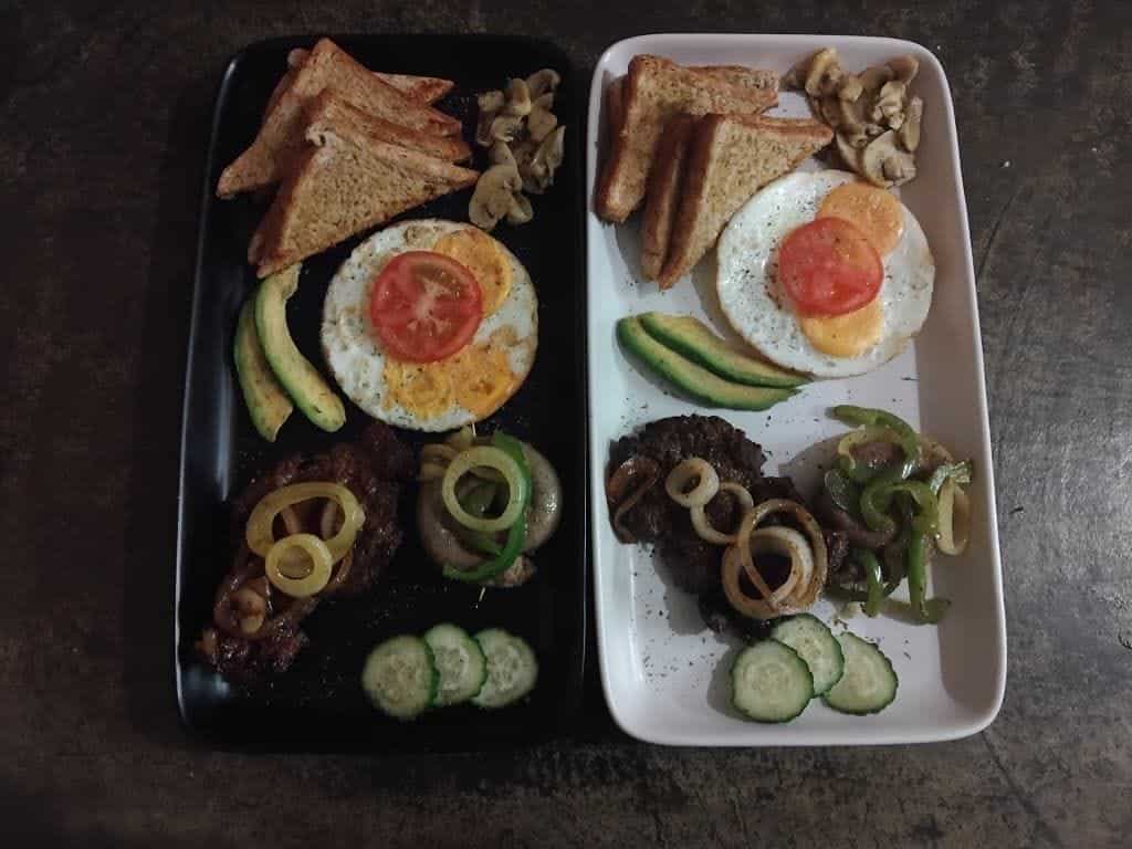 Breakfast platter with eggs, mushrooms and toast